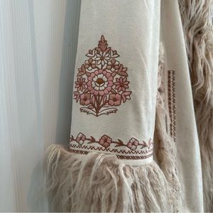 Spell & the Gypsy M/L NWOT coat. Never worn. Gorgeous. Stored in coat bag. Suede